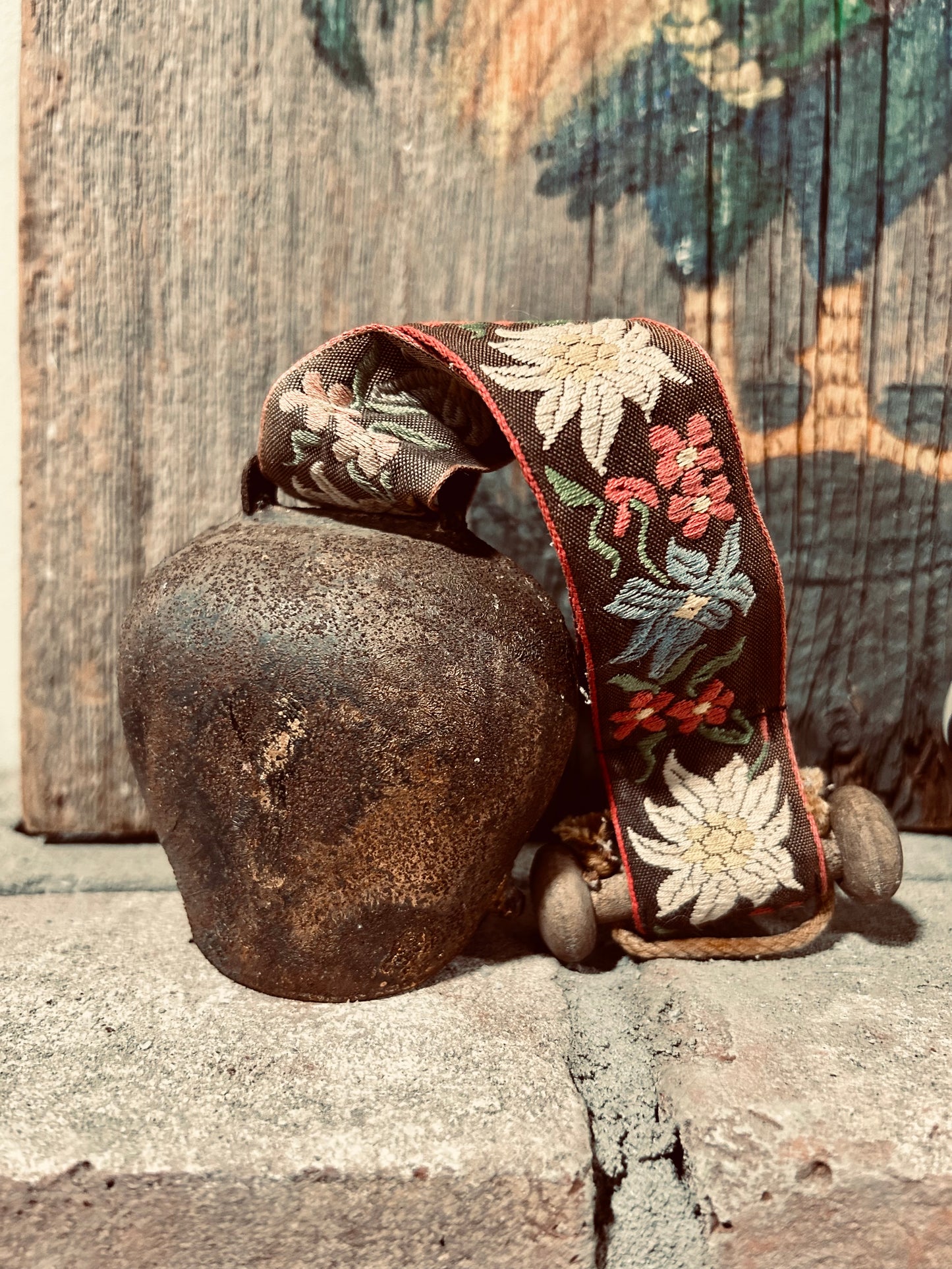 Antique Swiss Country Iron Cow Bell Hanging Floral Embroidered Strap Ornate Patina