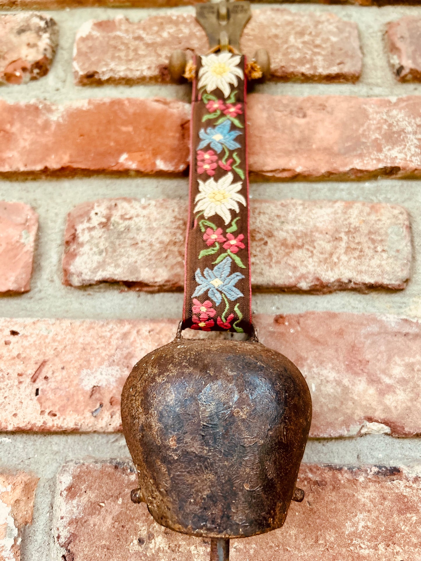 Antique Swiss Country Iron Cow Bell Hanging Floral Embroidered Strap Ornate Patina